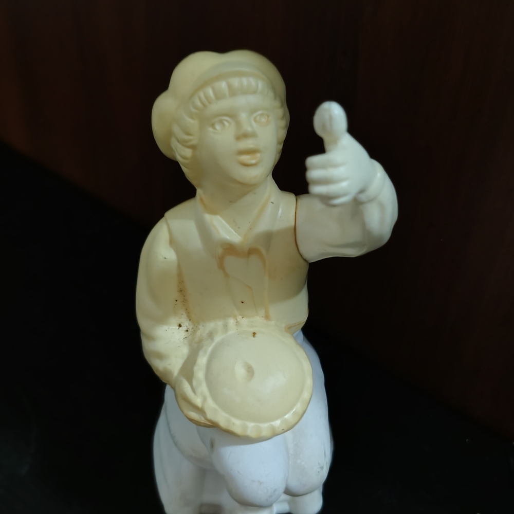 Avon Cream and White Figurine